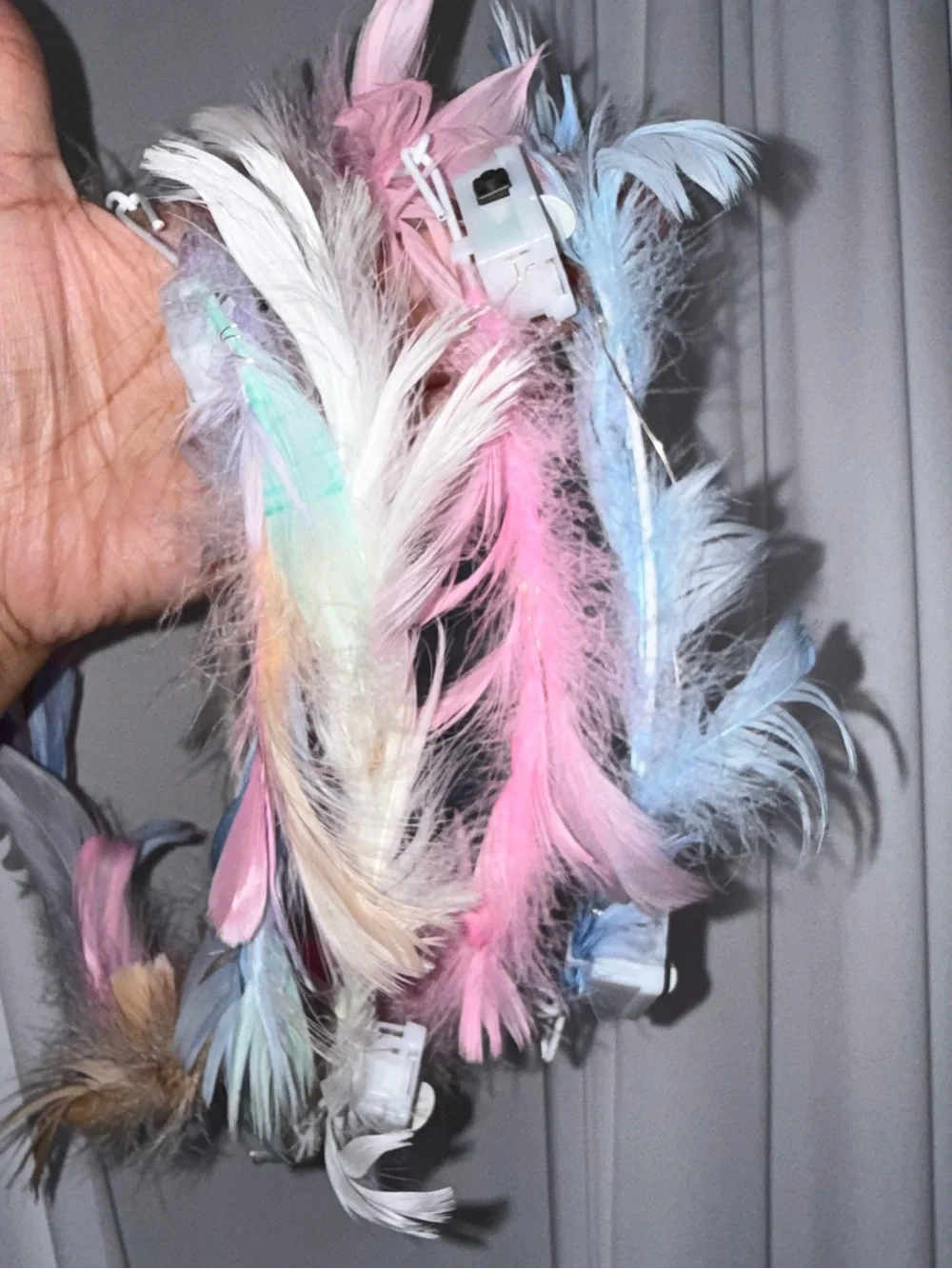 Brand new pack of 4 feather light up rave head bands